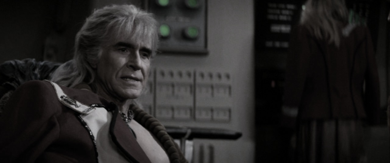 "In the command chair of the Reliant, Khan’s gaze burned with vengeance as he delivered his ultimatum to Kirk. The Genesis Device, a prize of creation and destruction, hung in the balance—a testament to the wrath of a man betrayed."