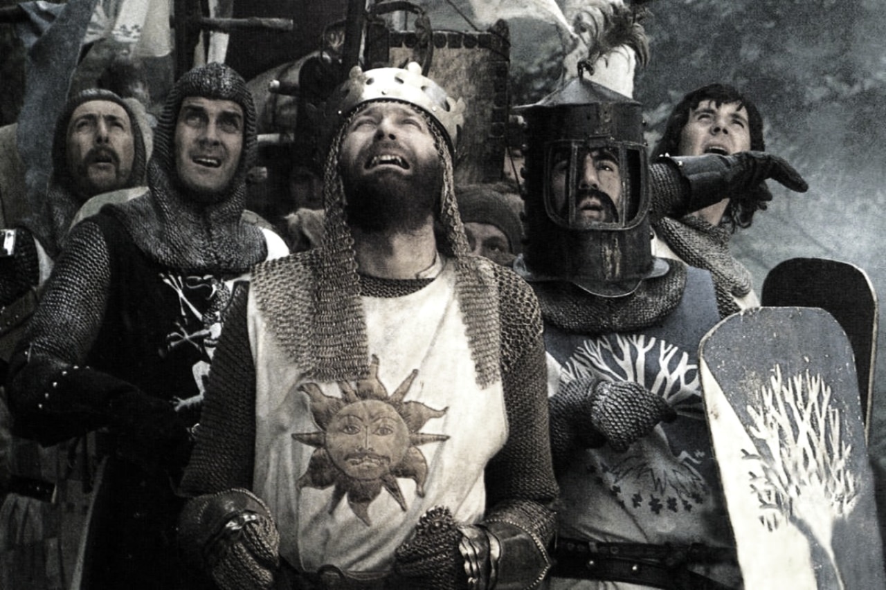 "Upon the battlements of the castle, the French taunters stood, their voices a cacophony of mockery and disdain, raining down upon Arthur and his knights. Below, the noble band gazed upward, their resolve unshaken, their honor a shield against the storm of ridicule. Arthur’s grip tightened upon his sword, a silent vow to endure, to prevail, to claim the grail that beckoned beyond the jeering walls."